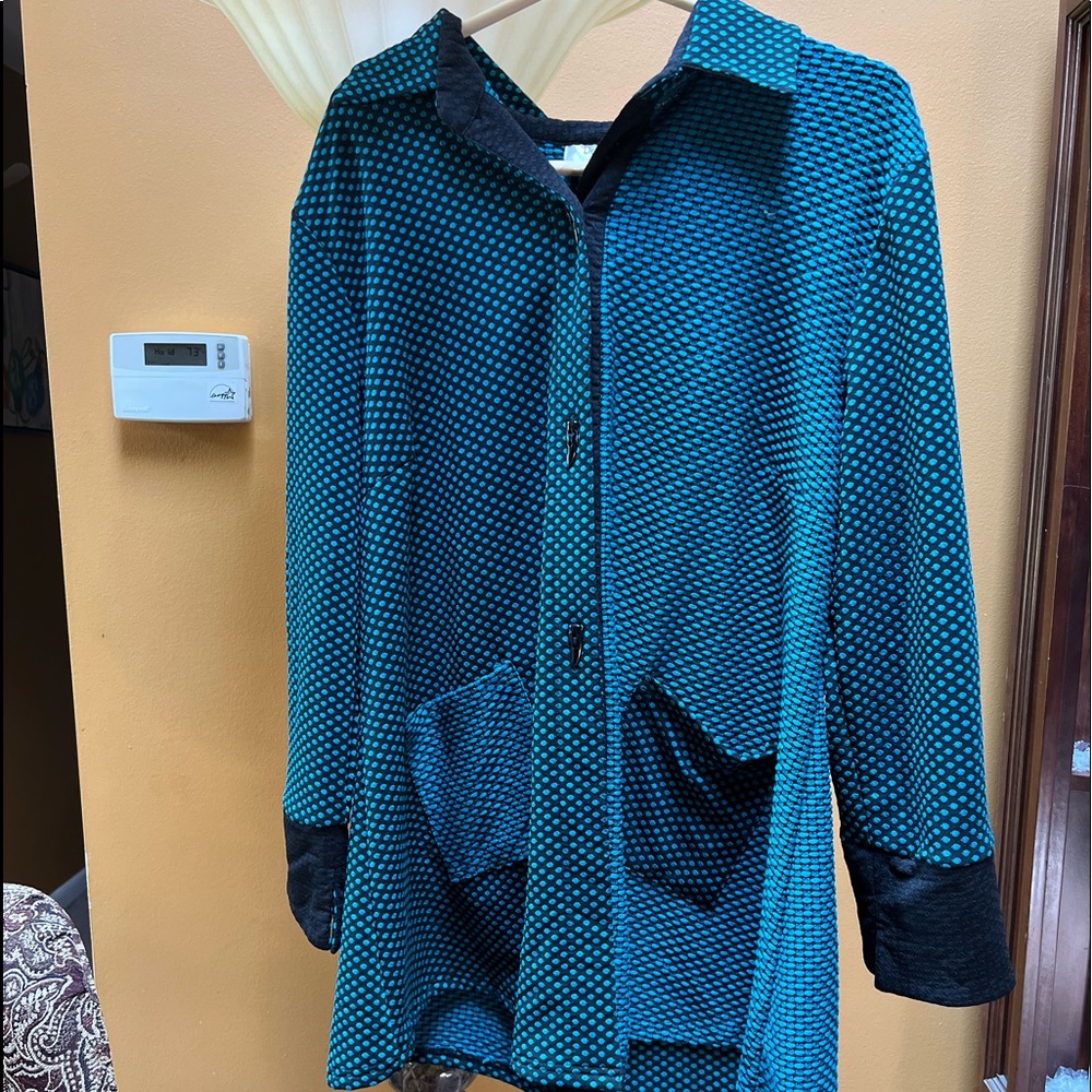 New Woman’s New Dorman Jacket. Size M. Colors are  turquoise and black.